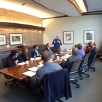 COA 2016 Attendees sitting around a conference table